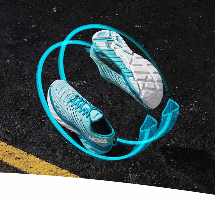 The HOKA Arahi 4 seen from the top and bottom with arrow graphics hovering over a street.